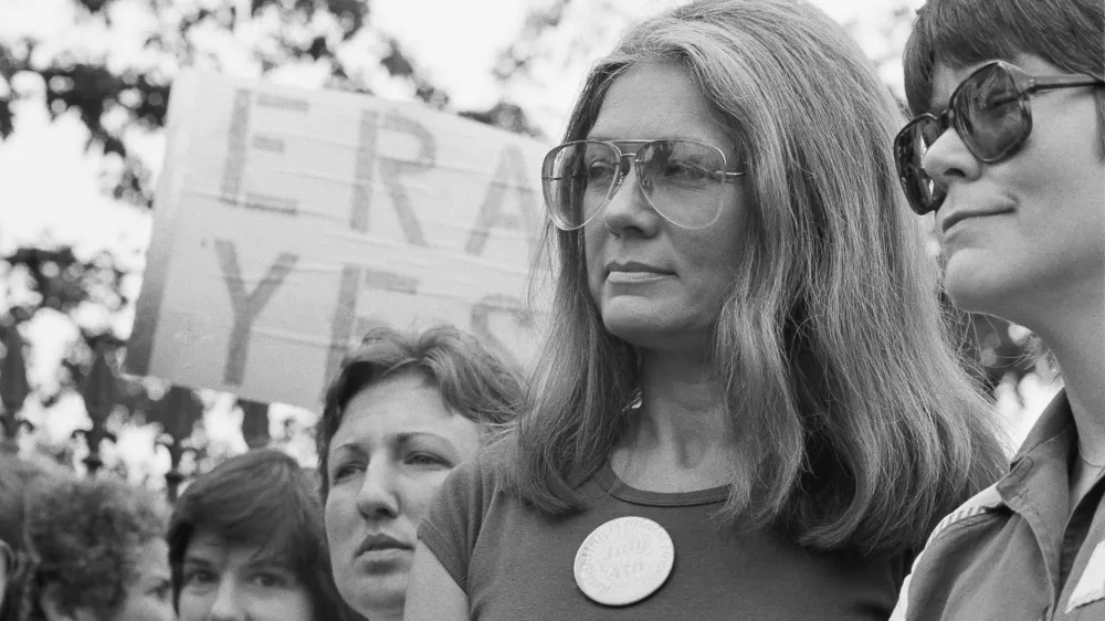 FILE - Gloria Steinem of the National Organization for Women attends an Equal Rights Amendment rally outside the White House on July 4, 1981, in Washington. (AP Photo/Scott Applewhite, File)
