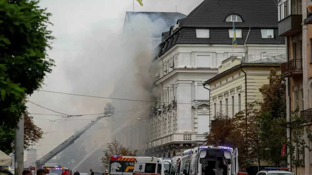 Firefighters work at a site of a building of the headquarters of Ukraine's SBU security service after a Russian drone strike, amid Russia's attack on Ukraine, in Kyiv, Ukraine September 4, 2026. REUTERS/Gleb Garanich
