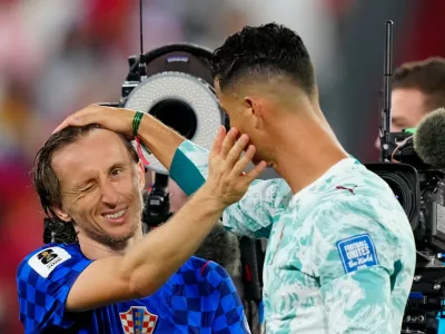 Croatia's Luka Modric (10) and Portugal's Cristiano Ronaldo (7) greet each other after the World Cup round of 32 soccer match between Portugal and Croatia in Toronto, Thursday, July 2, 2026. (Frank Gunn/The Canadian Press via AP)