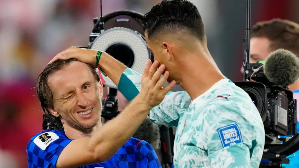 Croatia's Luka Modric (10) and Portugal's Cristiano Ronaldo (7) greet each other after the World Cup round of 32 soccer match between Portugal and Croatia in Toronto, Thursday, July 2, 2026. (Frank Gunn/The Canadian Press via AP)