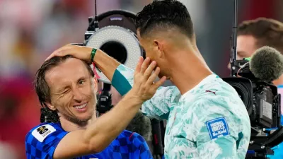 Croatia's Luka Modric (10) and Portugal's Cristiano Ronaldo (7) greet each other after the World Cup round of 32 soccer match between Portugal and Croatia in Toronto, Thursday, July 2, 2026. (Frank Gunn/The Canadian Press via AP)