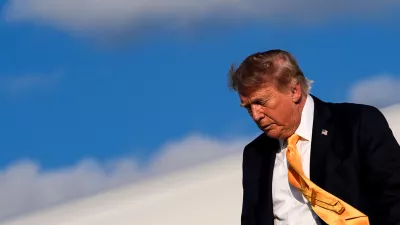 President Donald Trump disembarks Air Force One at Morristown Airport, Friday, Sept. 4, 2026, in Morristown, N.J. (AP Photo/Julia Demaree Nikhinson)