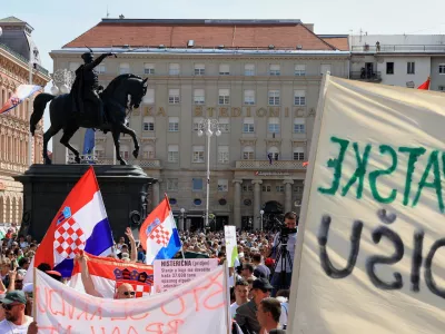 Thousands of people rally in protest over the discovery of illegally imported and disposed waste, including hazardous and toxic materials, in downtown Zagreb, Croatia, Saturday, Sept. 5, 2026. (AP Photo)