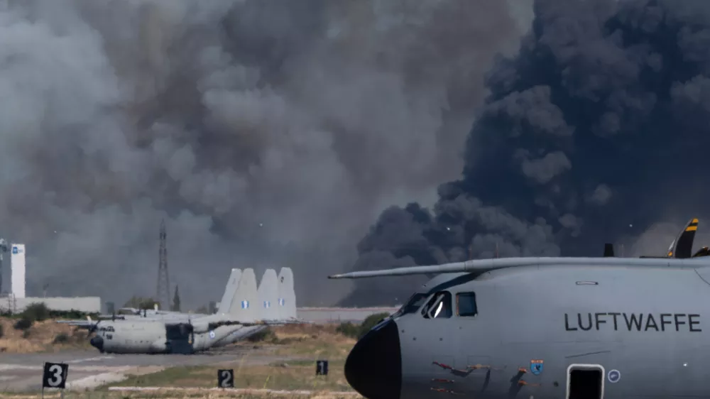 Smoke rises after a Hellenic Air Force F-4 Phantom fighter jet crashed, during the Athens Flying Week airshow at Tanagra Air Force Base, north of Athens, Greece, Saturday, Sept. 5, 2026. (AP Photo)