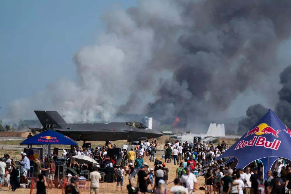 Smoke rises after a Hellenic Air Force F-4 Phantom fighter jet crashed, during the Athens Flying Week airshow at Tanagra Air Force Base, north of Athens, Greece, Saturday, Sept. 5, 2026. (AP Photo)