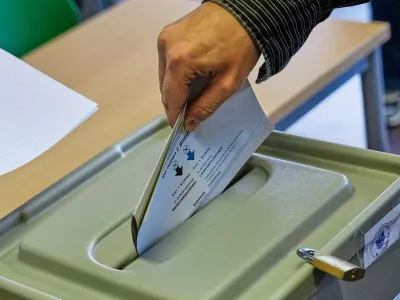 A man votes at a polling station during the Saxony-Anhalt state elections in Tangermuende, eastern Germany, Sunday, Sept. 6, 2026. (AP Photo/Matthias Schrader)