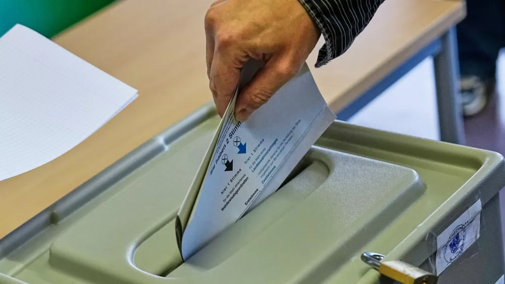 A man votes at a polling station during the Saxony-Anhalt state elections in Tangermuende, eastern Germany, Sunday, Sept. 6, 2026. (AP Photo/Matthias Schrader)