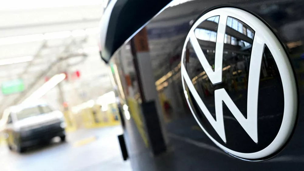 FILE PHOTO: The Volkswagen logo is displayed on a vehicle during a media tour at Volkswagen Commercial Vehicles (Volkswagen Nutzfahrzeuge) in Hanover, Germany, March 4, 2026. REUTERS/Fabian Bimmer/File Photo
