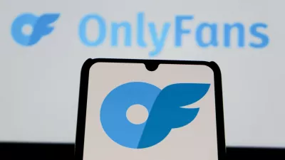 August 12, 2025, Indonesia: In this photo illustration, the OnlyFans logo is seen displayed on a mobile phone and in the background.,Image: 1028930566, License: Rights-managed, Restrictions:, Model Release: no
