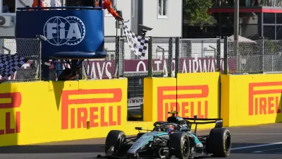 Mercedes driver Andrea Kimi Antonelli of Italy crosses the finish line to win the Italian Formula One Grand Prix race, in Monza, Italy, Sunday, Sept. 6, 2026. (AP Photo/Antonio Calanni)