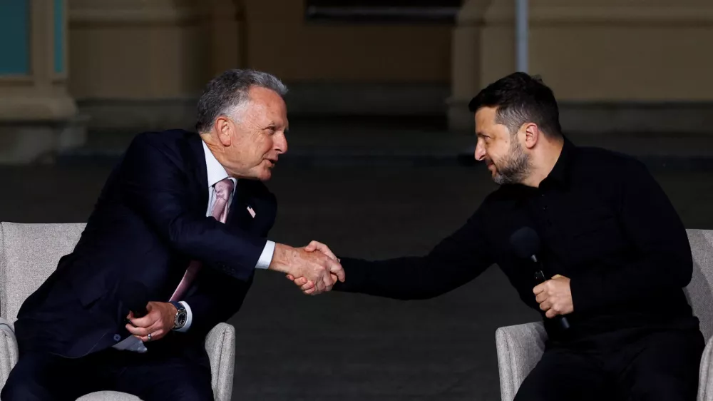 Ukraine's President Volodymyr Zelenskiy and U.S. Special Envoy Steve Witkoff shake hands after a joint news conference with Jared Kushner, U.S. President Donald Trump's son-in-law (not pictured), amid Russia's attack on Ukraine, in Kyiv, Ukraine September 6, 2026. REUTERS/Valentyn Ogirenko