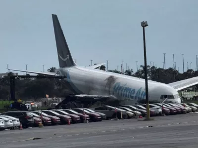 A view of the Amazon Prime Air cargo plane that airport officials said overran a runway at Miami, Florida, U.S., September 6, 2026, in this screengrab from a social media video. Rohan Ellis/via REUTERS THIS IMAGE HAS BEEN SUPPLIED BY A THIRD PARTY. MANDATORY CREDIT. NO RESALES. NO ARCHIVES. THIS PICTURE WAS PROCESSED BY REUTERS TO ENHANCE QUALITY. AN UNPROCESSED VERSION HAS BEEN PROVIDED SEPARATELY. VERIFICATION: - Date and location verified by metadata on original file - Fence, light poles and airfield layout matched archive imagery