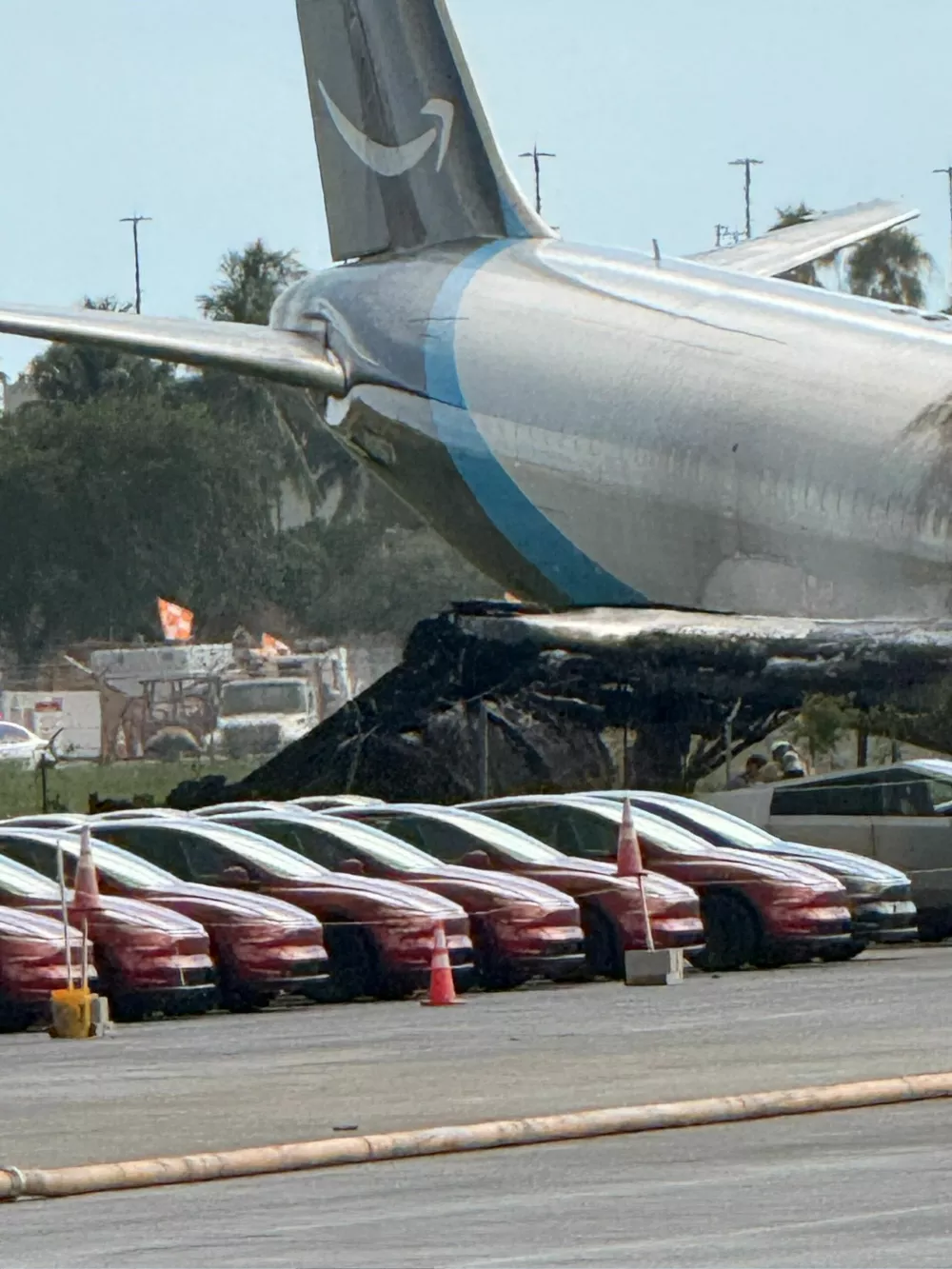 The wreckage of an Amazon Prime Air cargo plane that airport officials said overran a runway at Miami, Florida, U.S., September 6, 2026, in this photo from social media. Picture taken with a mobile phone. Rohan Ellis/via REUTERS THIS IMAGE HAS BEEN SUPPLIED BY A THIRD PARTY. MANDATORY CREDIT. NO RESALES. NO ARCHIVES.