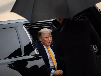 President Donald Trump gets out of the presidential SUV before boarding Air Force One, Friday, Sept. 4, 2026, at Joint Base Andrews, Md. (AP Photo/Julia Demaree Nikhinson)