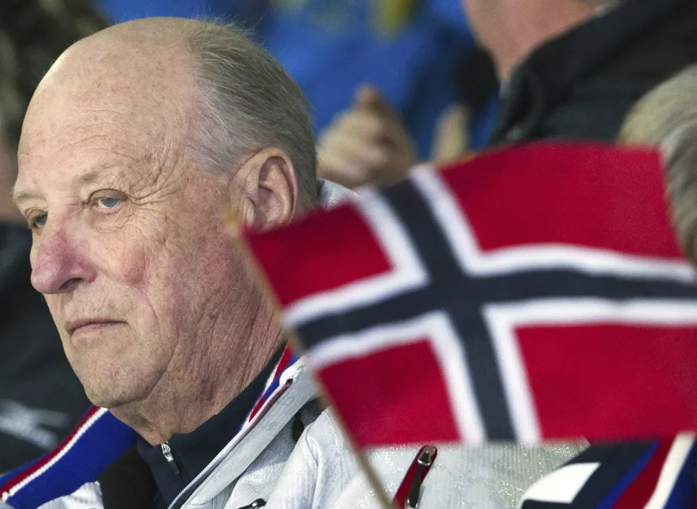 FILE - King Harald V of Norway watches Team Norway take on Team Great Britain during Olympic men's curling action at the Olympic Centre on Feb. 23, 2010 during the 2010 Vancouver Olympic Winter Games in Vancouver. (Nathan Denette, The Canadian Press via AP, File)