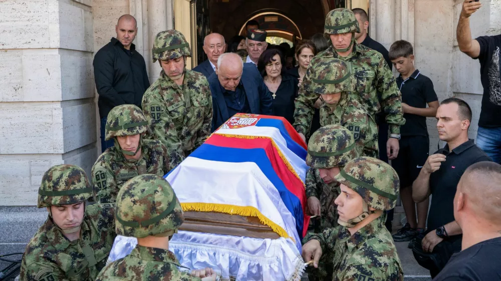 Serbian army soldiers carry the coffin of former Bosnian Serb wartime general Ratko Mladic outside the Church of St. Luke before burial, in Belgrade, Serbia, September 7, 2026. REUTERS/Uros Arsic