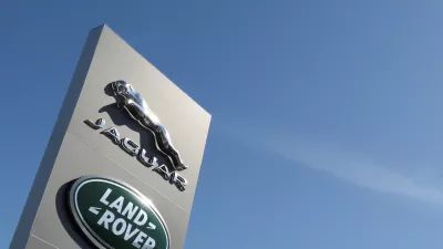 FILE PHOTO: Logos of Jaguar and Land-Rover are seen outside a car dealer, in Brussels, Belgium May 28, 2020. REUTERS/Yves Herman/File Photo