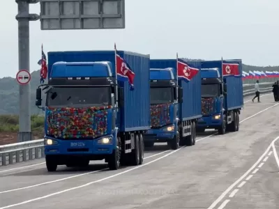 Trucks drive along a road during a ceremony opening the first road bridge between Russia and North Korea across the Tumen River, locally known as Tumannaya, on the border with North Korea in the Primorsky region, Russia, September 7, 2026, in this still image taken from a video. Governor of the Primorsky region Oleg Kozhemyako Telegram Channel/Handout via REUTERS ATTENTION EDITORS - THIS IMAGE WAS PROVIDED BY A THIRD PARTY. NO RESALES. NO ARCHIVES. MANDATORY CREDIT. OVERLAY FROM SOURCE.