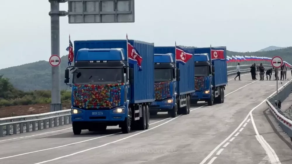 Trucks drive along a road during a ceremony opening the first road bridge between Russia and North Korea across the Tumen River, locally known as Tumannaya, on the border with North Korea in the Primorsky region, Russia, September 7, 2026, in this still image taken from a video. Governor of the Primorsky region Oleg Kozhemyako Telegram Channel/Handout via REUTERS ATTENTION EDITORS - THIS IMAGE WAS PROVIDED BY A THIRD PARTY. NO RESALES. NO ARCHIVES. MANDATORY CREDIT. OVERLAY FROM SOURCE.
