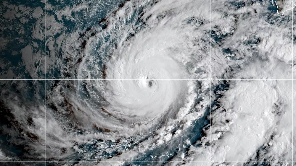 This satellite image released by NOAA shows Hurricane Lowell approaching Hawaii, Sunday, Sept. 6, 2026. (NOAA via AP)