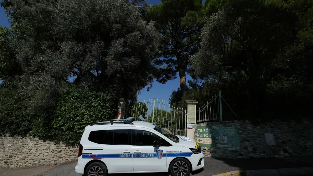 A French municipal police car is parked in front of the entrance of the Renoir Museum after four paintings were stolen by thieves in an early-morning break-in, with two recovered nearby, in Cagnes-sur-Mer, on the French Riviera, France, September 8, 2026. REUTERS/Manon Cruz