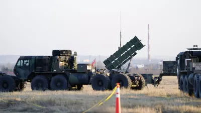 FILE - Patriot missiles are seen at the Rzeszow-Jasionka Airport, March 25, 2022, in Jasionka, Poland. The U.S. will send .8 billion in military aid to Ukraine in a massive package that will for the first time include a Patriot missile battery and precision guided bombs for their fighter jets, U.S. officials said Tuesday, Dec. 20, 2022, as the Biden administration prepares to welcome Ukrainian President Volodymyr Zelenskyy to Washington. (AP Photo/Evan Vucci, File)