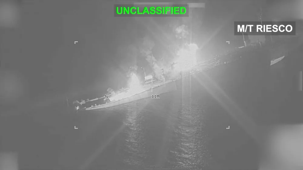 An Iranian crude oil carrier identified as M/T Riesco burns as it sinks after being struck, which U.S. Central Command says it targeted after attempted Iranian missile attacks on a U.S. Navy warship over the past two days, at a location given as the Gulf of Oman, in this still image taken from video released September 8, 2026.  U.S. Central Command/Handout via REUTERS  THIS IMAGE HAS BEEN SUPPLIED BY A THIRD PARTY. MANDATORY CREDIT. BLURRING AND OVERLAYS FROM SOURCE. Verification: - Location or date not verified - Deck layout, chimney, crane and vessel exterior matched archive images of the vessel - Ship tracking data showed tanker Riesco location in Gulf of Oman on September 8 - No older version found posted online before September 8