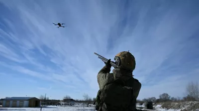 FILE PHOTO: A Russian serviceman of a separate engineering unit of the Southern Military District aims at a drone while undergoing an intensive combat training course to improve skills in setting up barriers, clearing terrain of mines and crossing water obstacles, amid the Russia-Ukraine conflict at a firing range in the Rostov region, Russia, January 19, 2026. REUTERS/Sergey Pivovarov/File Photo