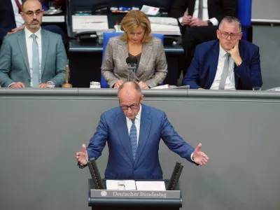 German Chancellor Friedrich Merz participates in the general debate as part of the budget deliberations in the Bundestag, in Berlin, Wednesday Sept. 9, 2026. (Kay Nietfeld/dpa via AP)
