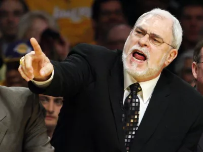 Los Angeles Lakers coach Phil Jackson gives instructions to his team during the first half of Game 5 of the NBA Finals basketball championship against the Boston Celtics in Los Angeles, June 15, 2008.  REUTERS/Lucy Nicholson   (UNITED STATES)