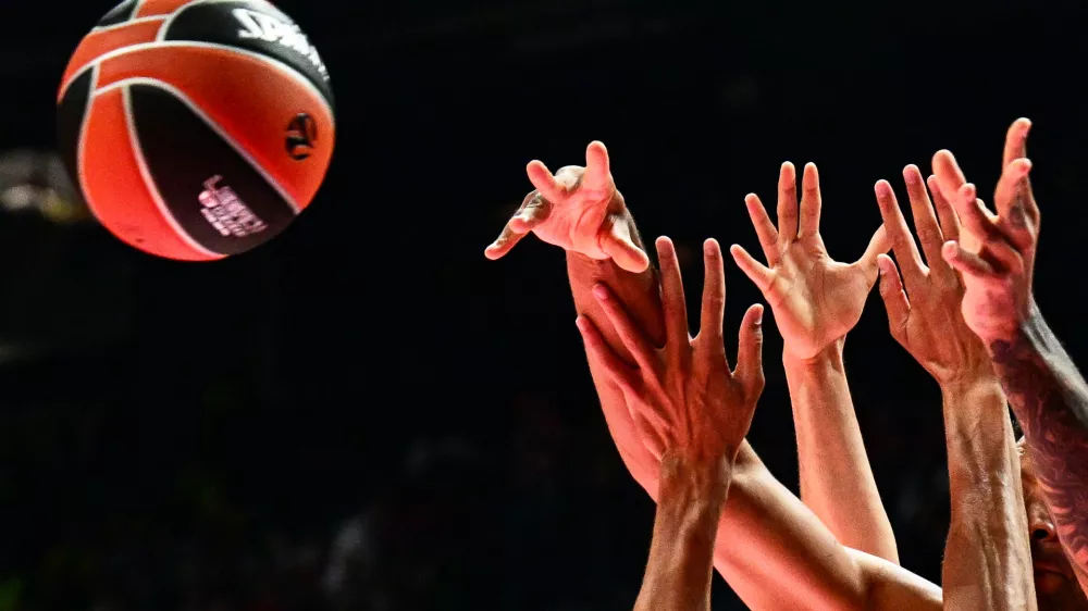 Players jump for the ball during the EuroLeague "Final Four" semi-final basketball match between Valencia Basket Club and Real Madrid Baloncesto at the Telekom Center Athens in Athens on May 22, 2026.,Image: 1104225328, License: Rights-managed, Restrictions:, Model Release: no 