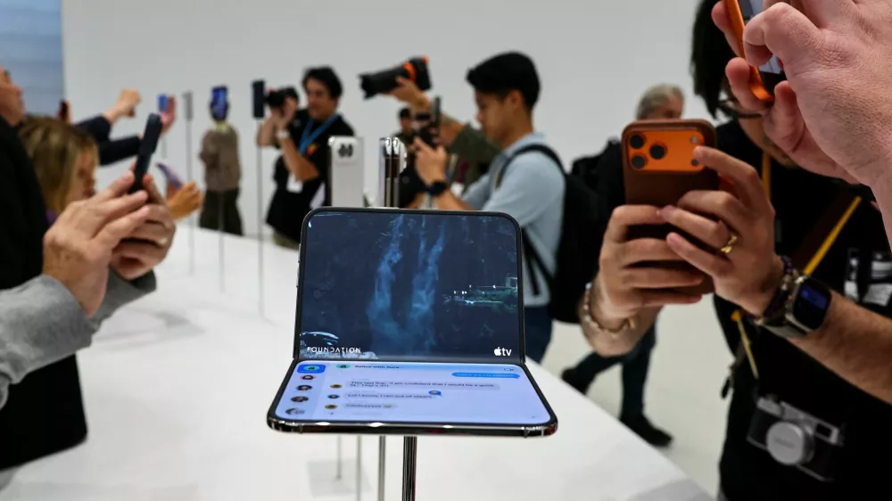 The new foldable iPhone Duo is on display during Apple's event at the Steve Jobs Theater in Cupertino, California, U.S. September 9, 2026. REUTERS/Carlos Barria