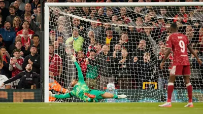 Atletico Madrid's goalkeeper Jan Oblak receives the second goal by Liverpool's Alexis Mac Allister during the Champions League opening phase soccer match between Liverpool and Atletico Madrid in Liverpool, England, Wednesday, Sept. 9, 2026. (AP Photo/Dave Thompson)