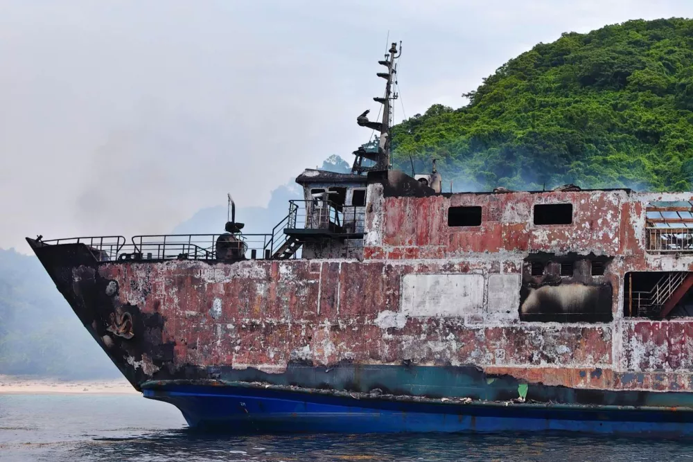 This photo provided by the Philippine Coast Guard, shows remains of ferry MV June Aster that caught fire off Palawan province, western Philippines on Thursday Sept. 10, 2026. (Philippine Coast Guard via AP)