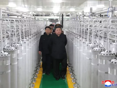 In this photo provided by the North Korean government, its leader Kim Jong Un, front right, visits a new facility to produce nuclear bomb fuels at an undisclosed place in North Korea Wednesday, June 3, 2026. Independent journalists were not given access to cover the event depicted in this image distributed by the North Korean government. The content of this image is as provided and cannot be independently verified. Korean language watermark on image as provided by source reads: "KCNA" which is the abbreviation for Korean Central News Agency. (Korean Central News Agency/Korea News Service via AP)