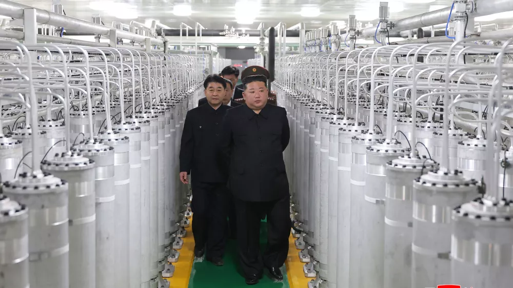 In this photo provided by the North Korean government, its leader Kim Jong Un, front right, visits a new facility to produce nuclear bomb fuels at an undisclosed place in North Korea Wednesday, June 3, 2026. Independent journalists were not given access to cover the event depicted in this image distributed by the North Korean government. The content of this image is as provided and cannot be independently verified. Korean language watermark on image as provided by source reads: "KCNA" which is the abbreviation for Korean Central News Agency. (Korean Central News Agency/Korea News Service via AP)