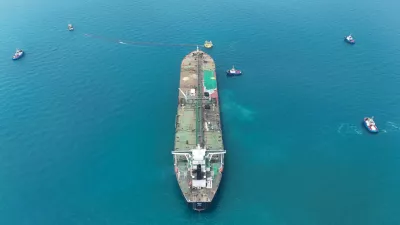 FILE PHOTO: Drone view of oil tanker HELGA berthed at one of Iraq's southern offshore oil terminals near Basra, as it prepares to load crude oil, becoming the second vessel to arrive since the closure of the Strait of Hormuz, April 24, 2026. REUTERS/Mohammed Aty//File Photo
