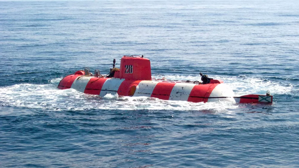 Russian AS-28 mini-submarine is seen just after it floated back to surface in the Pacific Ocean, August 7, 2005 in this file handout photo. Rescuers cut a Russian mini-submarine free of tangled deep-sea cables on Sunday, saving its seven crew with British help, after a three-day ordeal deep in the Pacific with dwindling oxygen. Picture taken August 7, 2005.  REUTERS/Handout/British Ministry of Defence/Jonathan Holloway