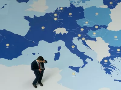 June 11, 2026, Frankfurt, Hesse, Germany: A man stands over a map on the European Central Bank building before a press conference following a Governing Council meeting in Frankfurt am Main, Germany. (Credit Image: &copy; Matias Basualdo/ZUMA Press Wire)