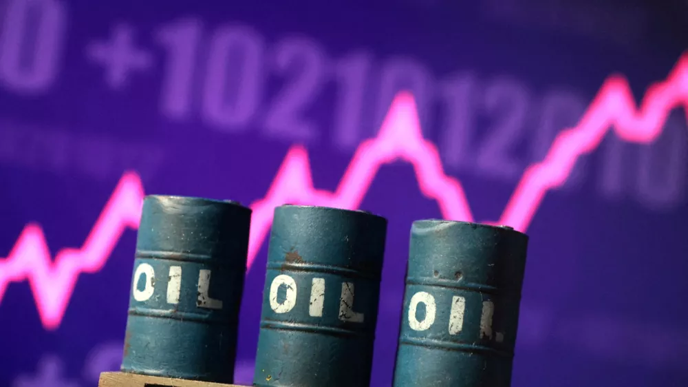 FILE PHOTO: 3D printed oil barrels and rising stock graph are seen in this illustration taken March 23, 2026. REUTERS/Dado Ruvic/Illustration/File Photo
