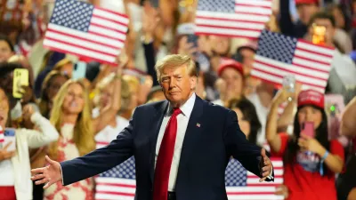 President Donald Trump greets supporters as he arrives on the stage at the Republican convention Thursday, Sept. 10, 2026, in Dallas. (AP Photo/Julio Cortez)