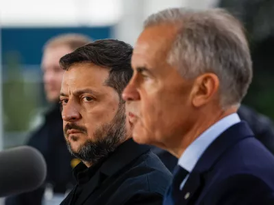 Canadian Prime Minister Mark Carney, right, and Ukraine's President Volodymyr Zelenskyy, speak after signing agreements in Calgary, Alberta, Canada, Thursday, Sept. 10, 2026. (Jeff McIntosh/The Canadian Press via AP)