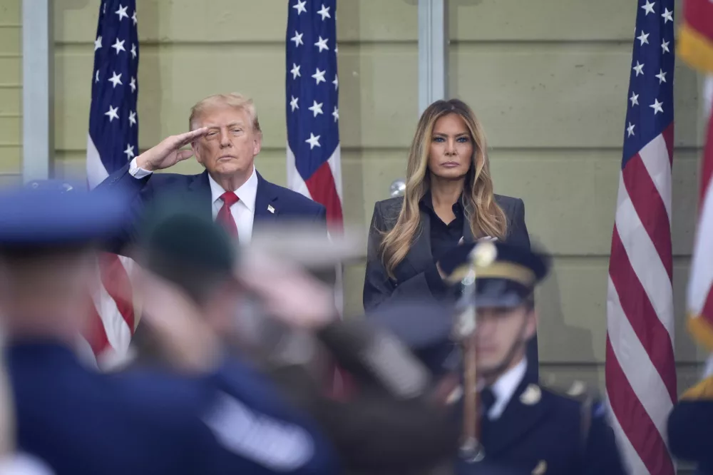 President Donald Trump and first lady Melania Trump, attend a ceremony to commemorate the 25th anniversary of the 9/11 attacks at the Pentagon, Friday, Sept. 11, 2026, in Washington. (AP Photo/Manuel Balce Ceneta)