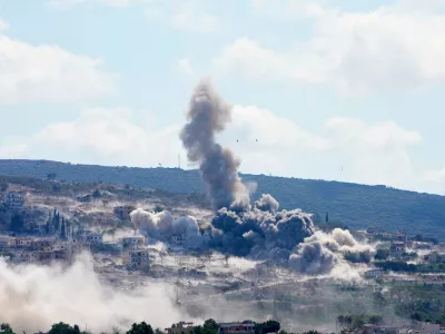 Smoke billow from an Israeli-controlled detonation in the village of Mansouri, as is seen from Hanniyeh village, southern Lebanon, Friday, Sept. 11, 2026. (AP Photo/Hussein Malla)