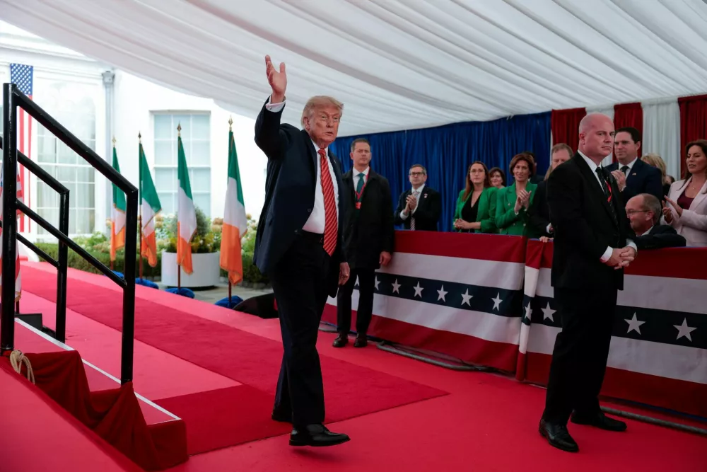 U.S. President Donald Trump waves after delivering remarks to U.S. embassy personnel and business leaders at Deerfield Residence, the residence of the U.S. Ambassador to Ireland, in Dublin, Ireland, September 12, 2026. REUTERS/Kylie Cooper