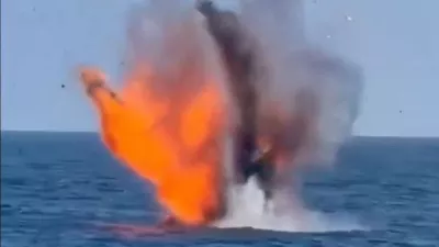 An explosion of what Romanian Defence Minister Radu Miruta said was one of two Gerbera-type drones drifting in Romania's Black Sea exclusive economic zone near the offshore gas project Neptun Deep, in this frame taken from a handout video released on August 11, 2026. Radu Miruta via Facebook/Handout via REUTERS THIS IMAGE HAS BEEN SUPPLIED BY A THIRD PARTY. NO RESALES. NO ARCHIVES