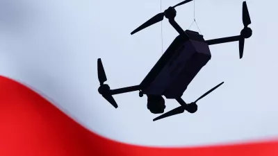 A drone is displayed in front of a Polish flag at the WB Group exhibition during the first day of the International Defence Industry Exhibition (MSPO) in Kielce, Poland, September 8, 2026. REUTERS/Kacper Pempel
