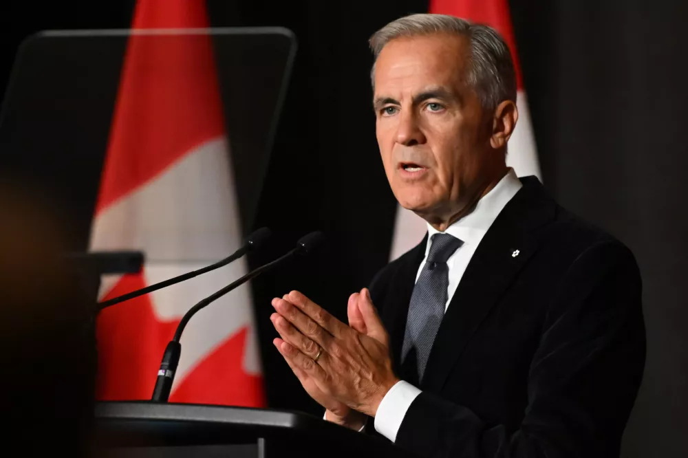 Canadian Prime Minister Mark Carney speaks to Canadian business leaders at the Canada Investment Summit welcome reception in Toronto, Sunday, Sept. 13, 2026. (Jon Blacker/The Canadian Press via AP)