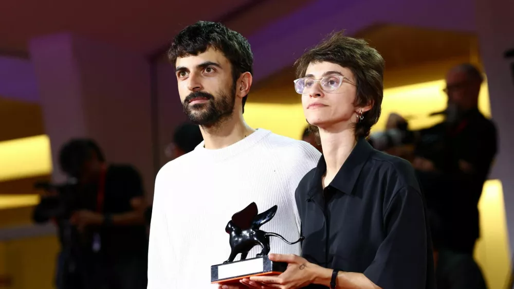 Directors Yuval Abraham and Rachel Szor pose with the Special Jury Award for "Naza" during the closing ceremony of the 83rd Venice International Film Festival, Italy, September 12, 2026. REUTERS/Yves Herman