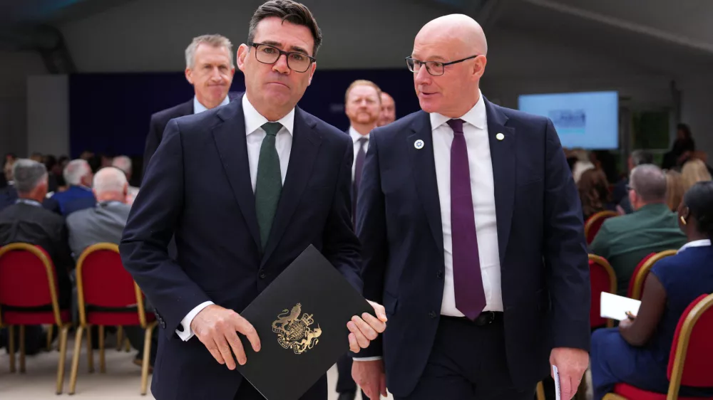 LONDON, ENGLAND - AUGUST 21: Prime Minister Andy Burnham and Scottish First Minister John Swinney leave after the first National Day for Victims and Survivors of Terrorism memorial event at Lancaster House on August 21, 2026 in London, England.  Carl Court/Pool via REUTERS